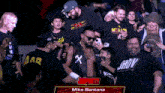 a wrestler named mike santana is in the crowd