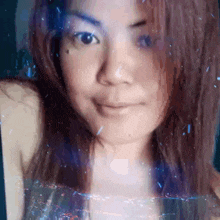 a close up of a woman 's face with a purple background
