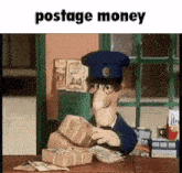 a cartoon postman is sitting at a desk with a pile of money .