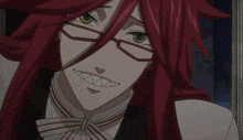 a cartoon character with red hair and glasses is making a funny face