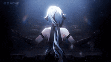 a woman with white hair is standing in front of a movie logo