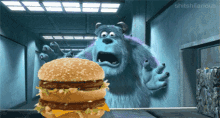 A GIF - Monsters Inc Sully Burger GIFs