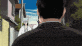 a man in a black suit stands in front of a group of anime characters