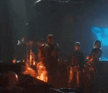 a blurry picture of people standing in front of a blue window