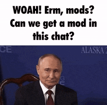 a man in a suit and tie with the words woah erm mods can we get a mod in this chat behind him