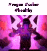 a blurry picture of a person with the words `` vegan # sober # healthy '' written above them .