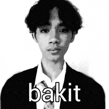 a black and white photo of a man in a suit and tie with the word bakit in white letters
