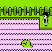 a pixel art of a person standing next to a green worm on a pink and green background .