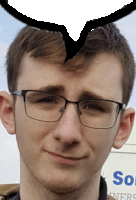 a man wearing glasses is smiling in front of a sign that says so on it