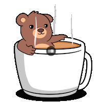 a teddy bear is sitting in a cup of coffee