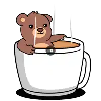 a teddy bear is sitting in a cup of coffee