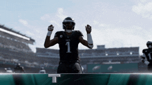a football player with the number 1 on his jersey jumps in the air