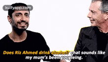 two men are shaking hands and one of them says " does riz ahmed drink alcohol "
