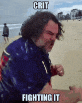 a man is standing on a beach with the words crit fighting it above him