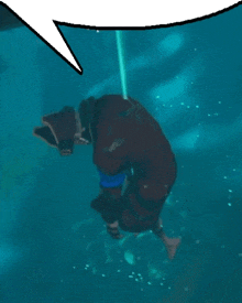 a cartoon character is floating in the water with a speech bubble behind him