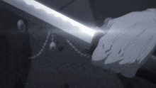 a person holding a sword in their hand