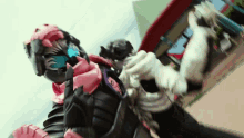 a blurred image of a person in a robot costume standing in front of a building .
