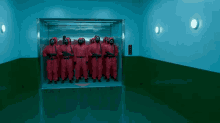 Squid Game Pink Soldiers GIF - Squid Game Pink Soldiers Lift GIFs