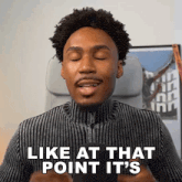 a man says " like at that point it 's " while sitting in a chair