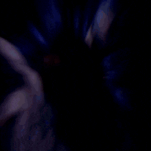 a blurry picture of a person holding something in their hands