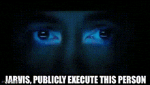 a close up of a person 's face with the words `` jarvis , publicly execute this person '' below it .