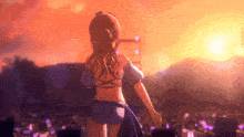 a girl in a bikini stands in front of a crowd of people