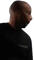 a man wearing a black shirt with the word security on the front