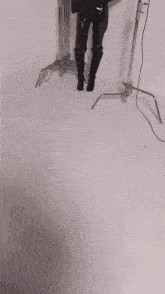 a broncolor softbox sl20 is hanging over a mannequin 's legs