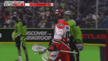 a lacrosse game is being played and the score is 9 to 0