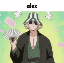 a man in a striped hat is holding a fan with the name alex above him