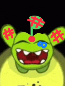 a drawing of a green monster with a cherry on top