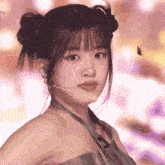 a close up of a girl wearing a microphone
