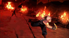 a man in a video game is running in front of a fire