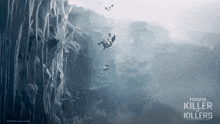 a poster for predator killer of killers shows a man falling into the water