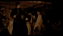 a man and a woman are standing next to each other