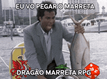 a man holding a large fish with the words eu vo pegar o marreta rpg