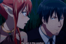 a man and a woman are standing next to each other and the man says remain in this position