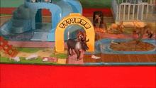 a toy reindeer is standing in front of a yellow archway that says 1177