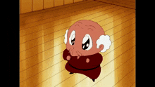 a cartoon character is standing on a wooden floor with his arms crossed
