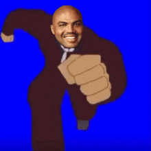 a man in a suit and tie is running with a fist in his hand
