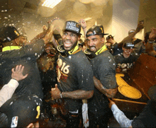 a man wearing a t-shirt that says nba champions on it