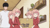 a couple of anime girls are holding a cardboard box that says um dois bip-bip