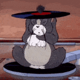 a cartoon cat is sitting on a record player holding a record in its paws .