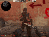 a video game screen shows a man holding a knife in front of a wall with graffiti on it