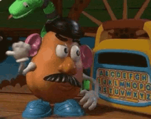 Mr Potato Head Back Hurts GIF - Mr Potato Head Back Hurts Toy Story GIFs
