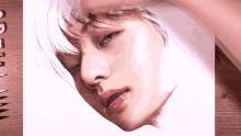 a close up of a drawing of a person 's face on a piece of paper