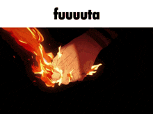 a picture of a person holding a fire with the word fuuuuta above them