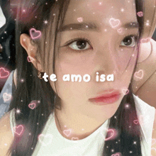 a close up of a girl 's face with the words te amo isa written on it