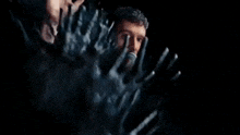 a group of hand prints on a glass surface