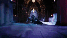 a man is crawling on the floor in a hallway